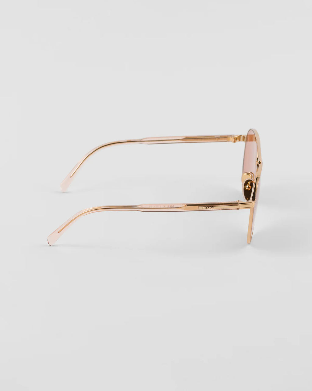 LUNETTES  DE SOLEIL ORNÉES DU LOGO PRADA
VERRES TERRACOTTA