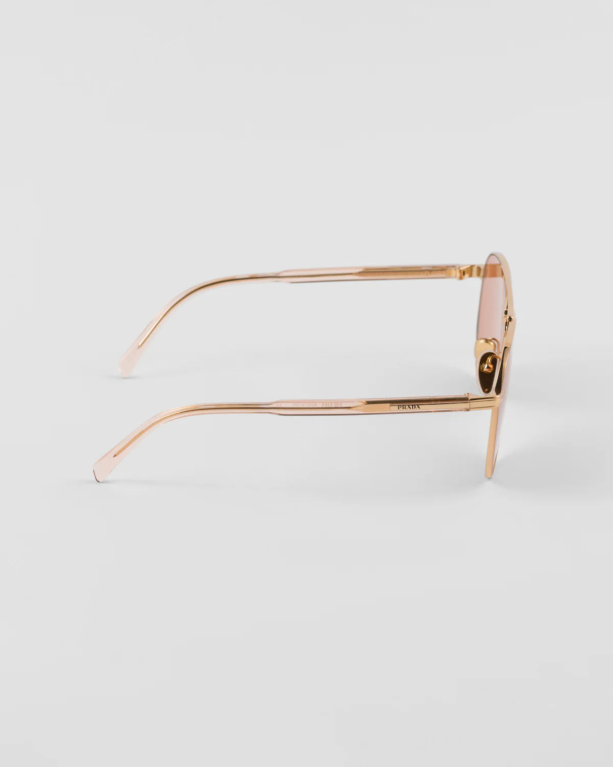 LUNETTES  DE SOLEIL ORNÉES DU LOGO PRADA
VERRES TERRACOTTA
