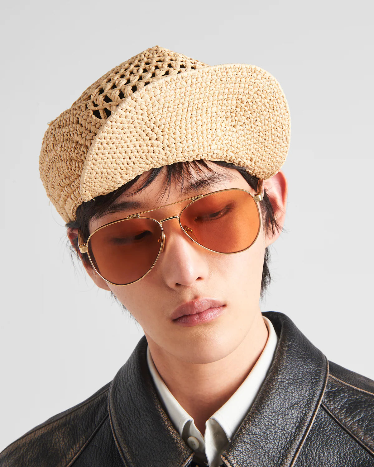 LUNETTES  DE SOLEIL ORNÉES DU LOGO PRADA
VERRES TERRACOTTA